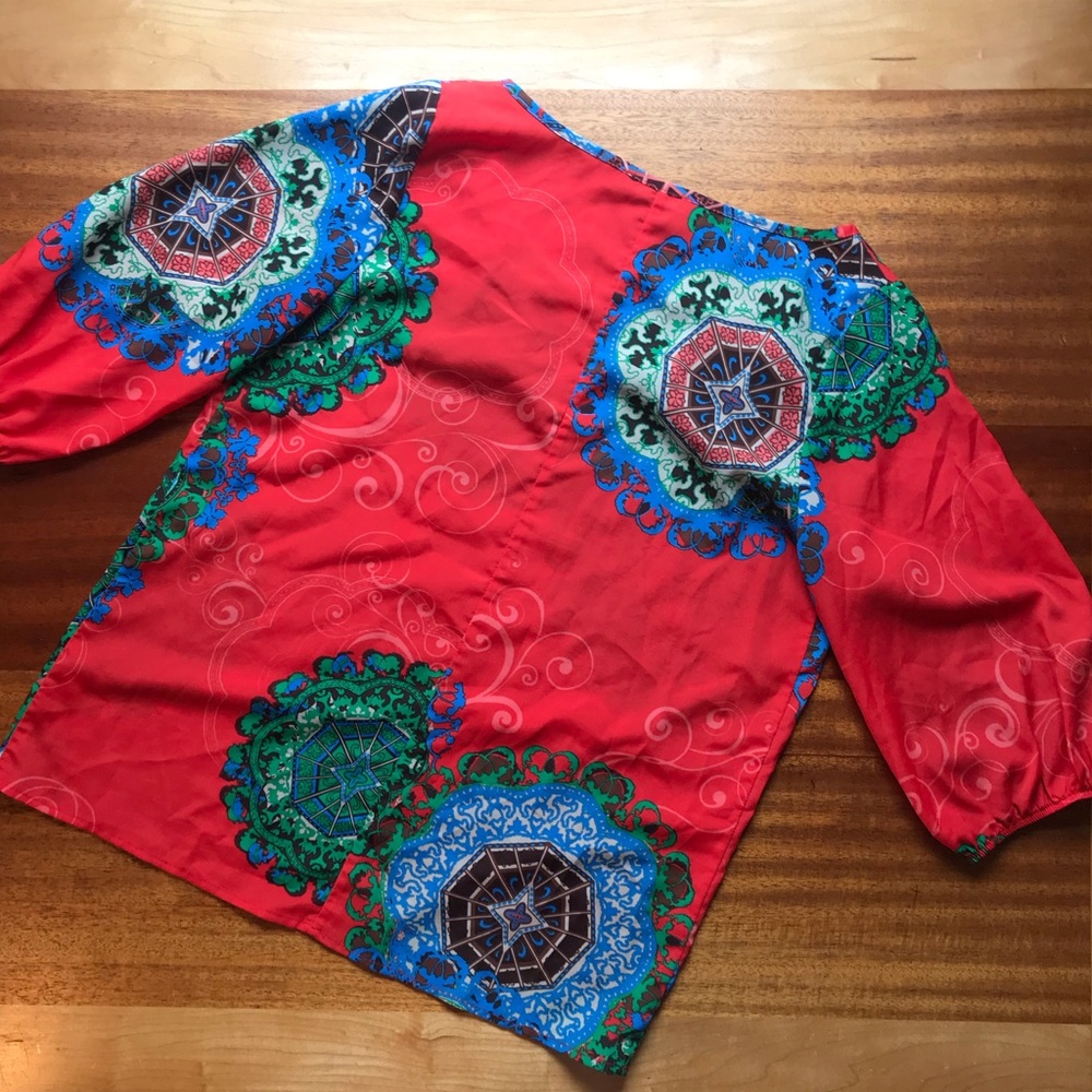 Women’s colorful blouse size small